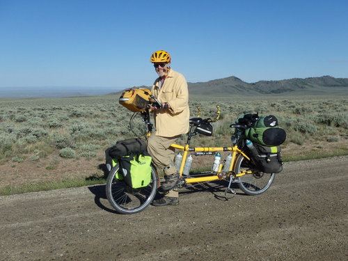 GDMBR: Dennis Struck & the Bee - We are at Continental Divide Crossing #9 of the Great Divide Mountain Bike Route. The elevation, according to Ride with GPS is 8160'/2487m.